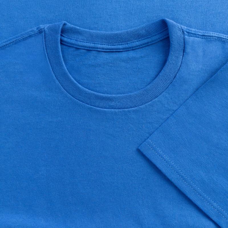 a group of kitten playing a pink ribbon